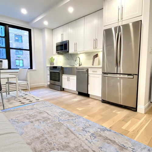 Each home is fully renovated spacious living room open to kitchen and dining areas